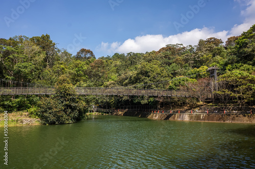 pond with suspension bridge at Toushe Reservoi