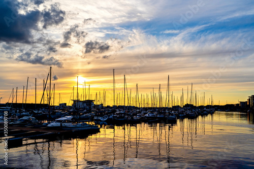 Sunset in Harbour full of sailboats in Helsingborg, Sweden. Summer in Southern Sweden concept © Elena Sistaliuk