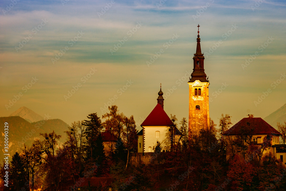 the Christian church in the mountains at the end of autumn