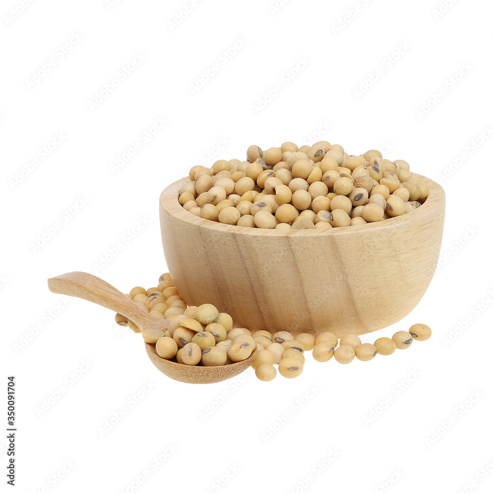 Soy beans in a wooden bowl isolated on white background. Soy beans in a wooden bowl isolated on white background.