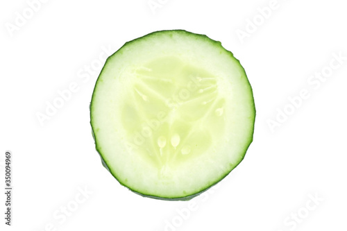 close up of green cucumber slice isolated on white
