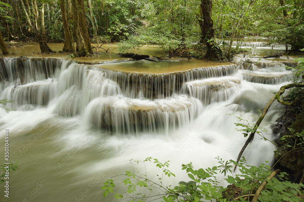 Beautiful waterfall with stones in forest, Thailand Beautiful waterfall with stones in forest, Thailand