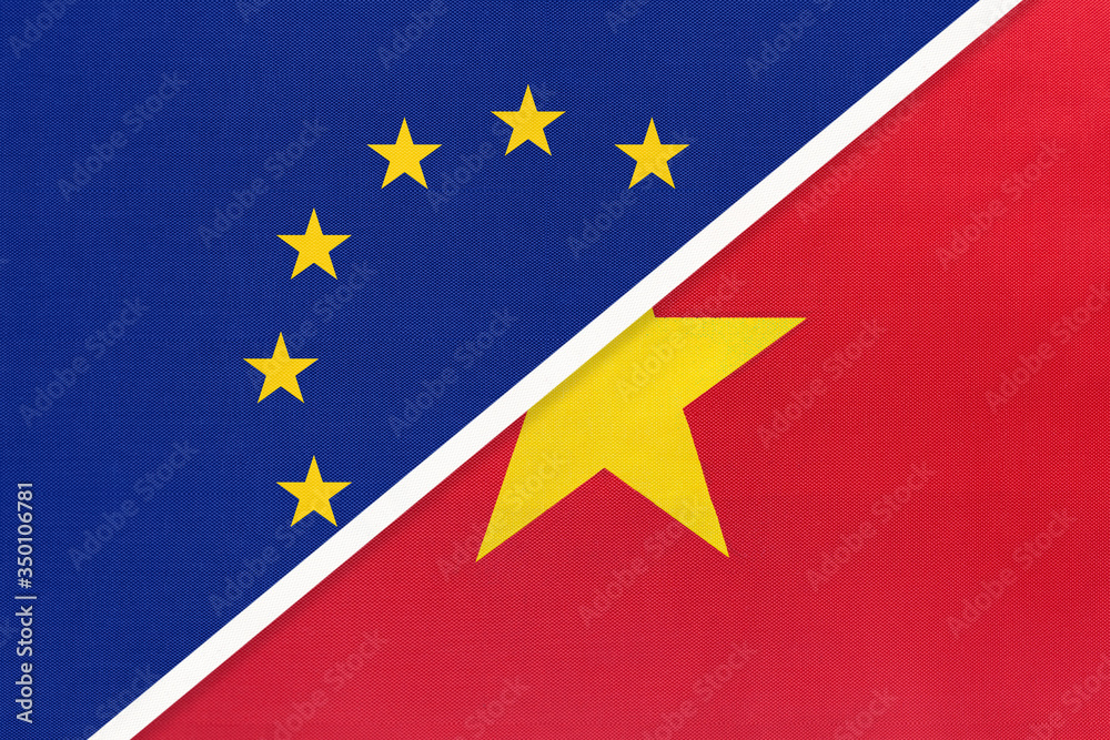 European Union or EU and Vietnam national flag from textile. Symbol of the Council of Europe association.