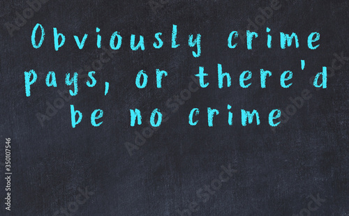 Chalk wise inscription on black chalkboard photo