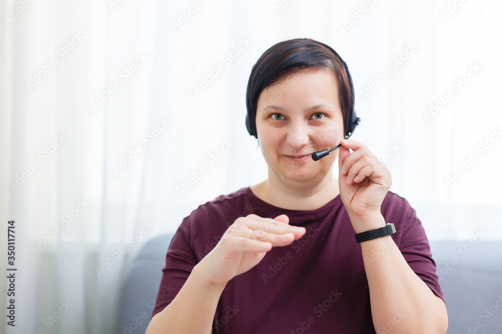 Headshot portrait of smiling young woman. girl with happy facial expression looking at camera with joy, communicating with friends via internet telephony, making video call. Close up. Front view Headshot portrait of smiling young woman. girl with happy facial expression looking at camera with joy, communicating with friends via internet telephony, making video call. Close up. Front view