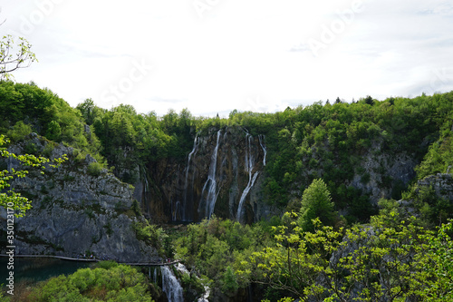 Waterfalls landscape with natural green mountain cliff at Plitvice Lakes National Park, Croatia UNESCO World Heritage 