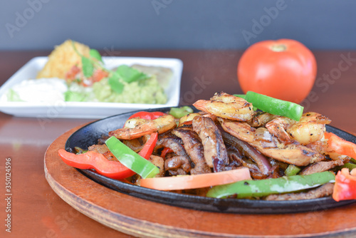 Fajitas - Nice Mexican Food make with Pork / Chicken / Beef, Tomata, papper and spice. photo