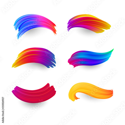 Bright gradient paint brush strokes set. Isolated Elements. Colorful spectrum brush design in pink, blue and orange colors isolated on white background. Vector illustration.