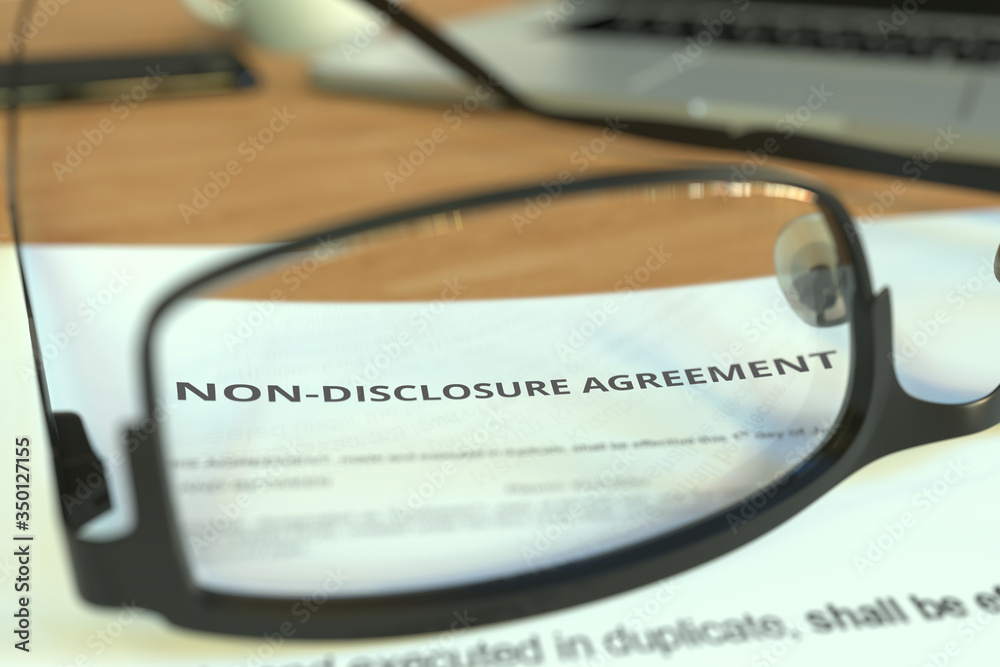 Copy of a non-disclosure agreement NDA behind glasses on a desk, 3D rendering Copy of a non-disclosure agreement NDA behind glasses on a desk, 3D rendering
