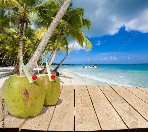 Wooden tabletop with coconu...