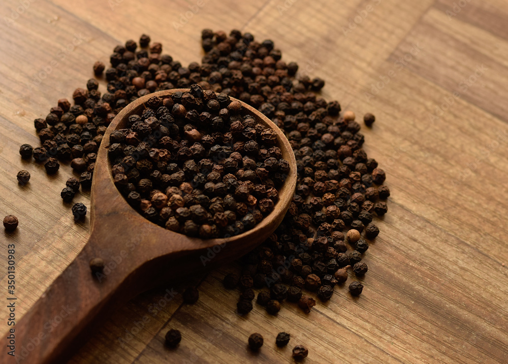 Pepper with wooden background Pepper with wooden background