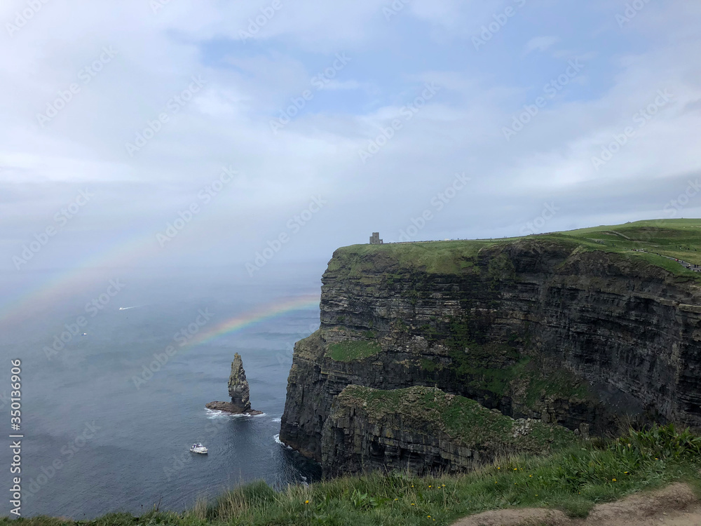 Burren Way and Cliffs of Moher along Irish Coast with Rainbow