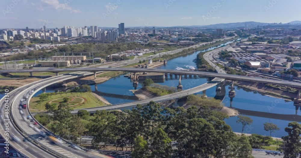 Aerial hyperlapse with heavy traffic shot during the day with long exposure. Bridge in marginal Tiete avenue in Sao Paulo, Brazil Aerial hyperlapse with heavy traffic shot during the day with long exposure. Bridge in marginal Tiete avenue in Sao Paulo, Brazil