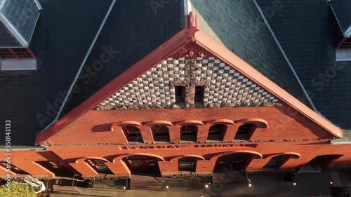 Descending aerial of old brick farmers market building in Lancaster Pennsylvania, central market