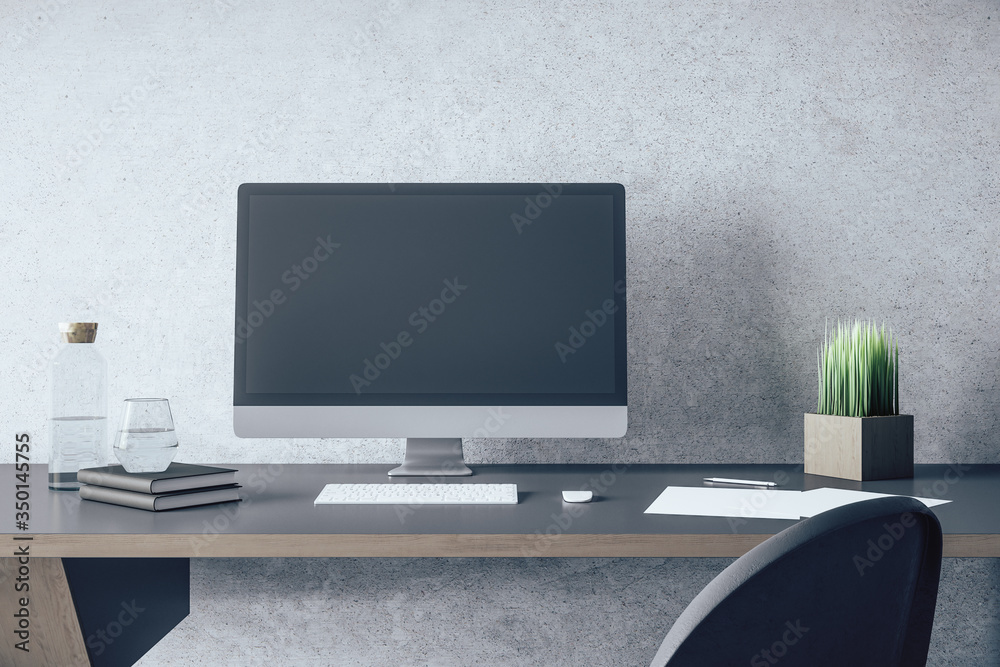 Stylish designer desktop with empty computer screen Stylish designer desktop with empty computer screen
