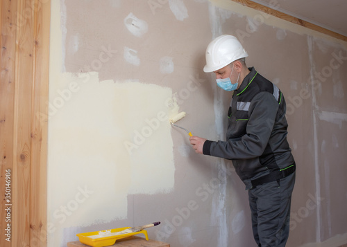 construction engineer at a construction site in a mask