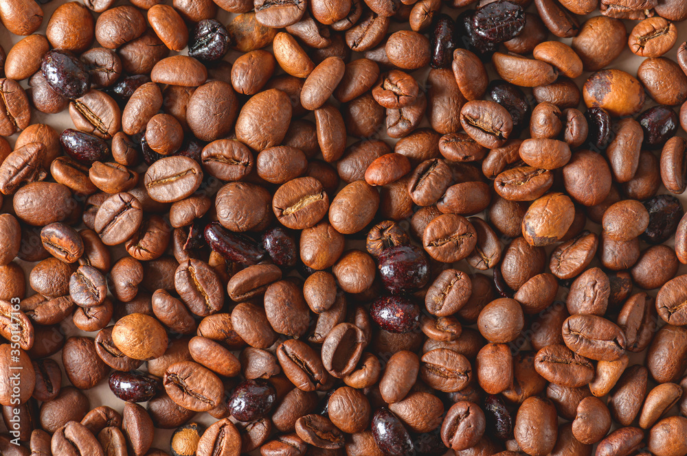 Coffee beans texture high quality background. Roasted coffee beans. Mixture of different kinds of roasted coffee beans background. Coffee beans texture high quality background. Roasted coffee beans. Mixture of different kinds of roasted coffee beans background.