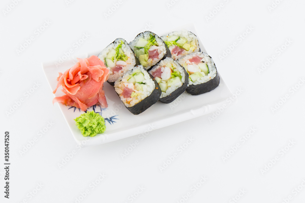 Close-up of traditional Japanese sushi on a white background. Design of the sushi bar menu. Japanese cuisine.