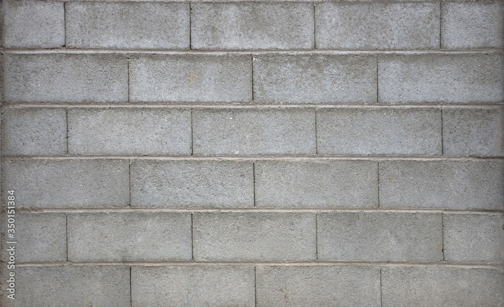 Fototapeta premium Old grey brick wall texture, abstract background