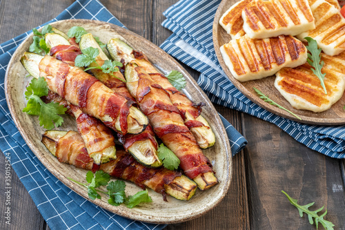 Grilled zucchini fries wrapped in a bacon and halloumi cheese