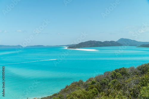 Fototapeta Naklejka Na Ścianę i Meble -  Whitehaven beach aerial view, Whitsundays. Turquoise ocean, white sand. Dramatic DRONE view from above. Travel, holiday, vacation, paradise. Shot in Hill Inlet, Queenstown, Australia.