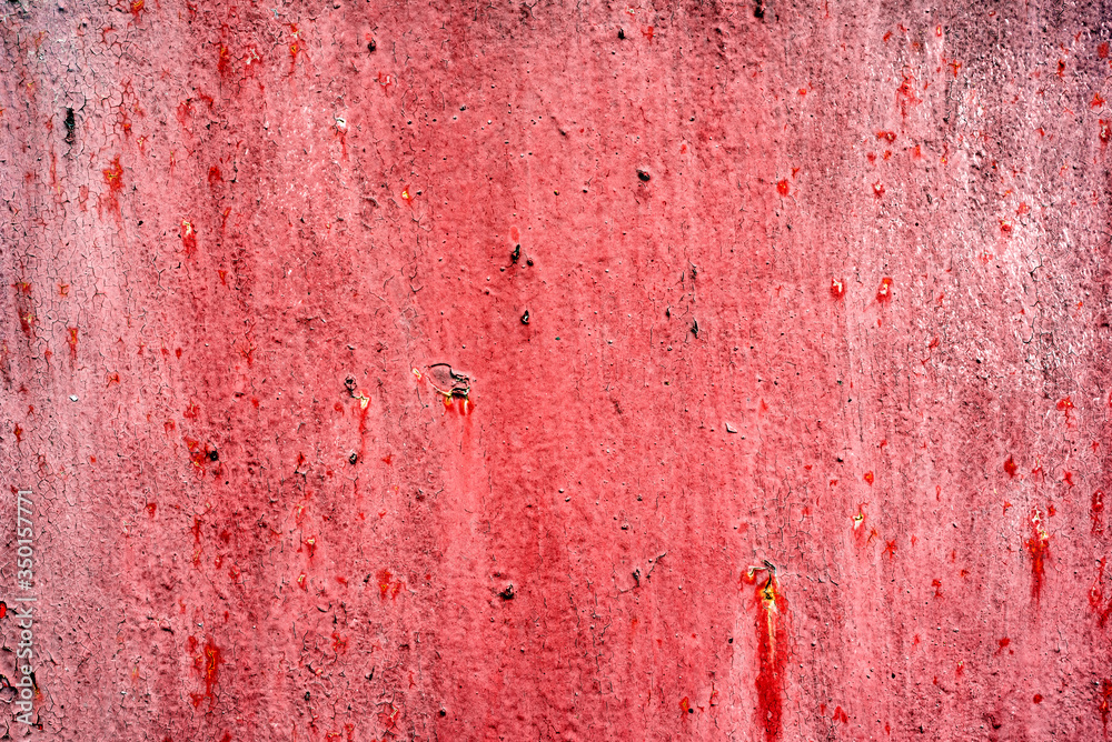 Texture of a metal wall with cracks and scratches which can be used as a background Texture of a metal wall with cracks and scratches which can be used as a background