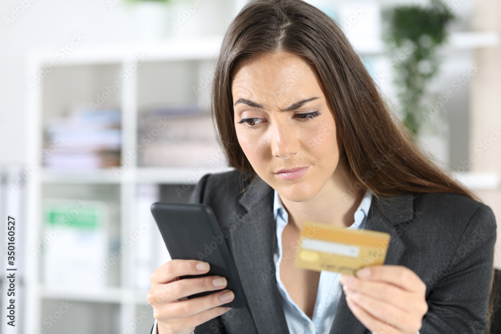 Suspicious executive pays with card on phone at office