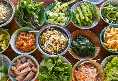 Variety of local vegetables, having with curry and rice noodle - Thailand southern style 