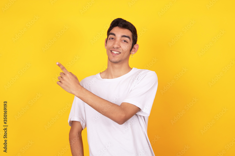 young male teenager isolated on color background young male teenager isolated on color background