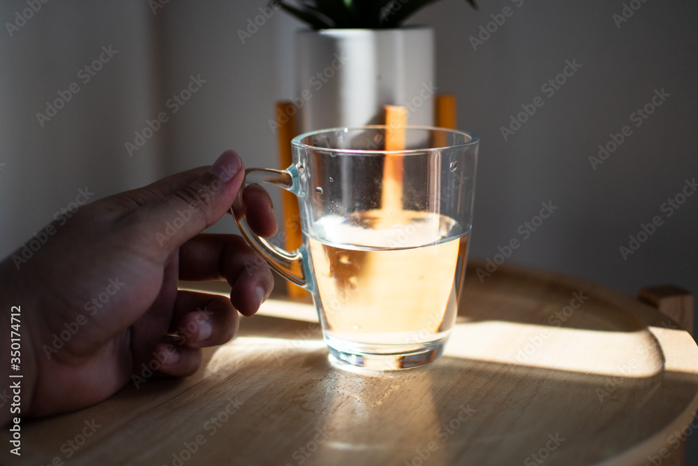 having a fresh wake up in the moring with a glass of water having a fresh wake up in the moring with a glass of water