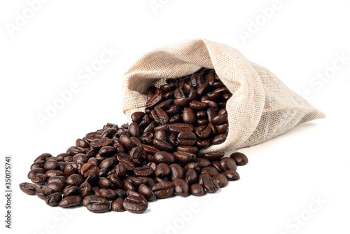 Roasted coffee beans in bag isolated on white background.