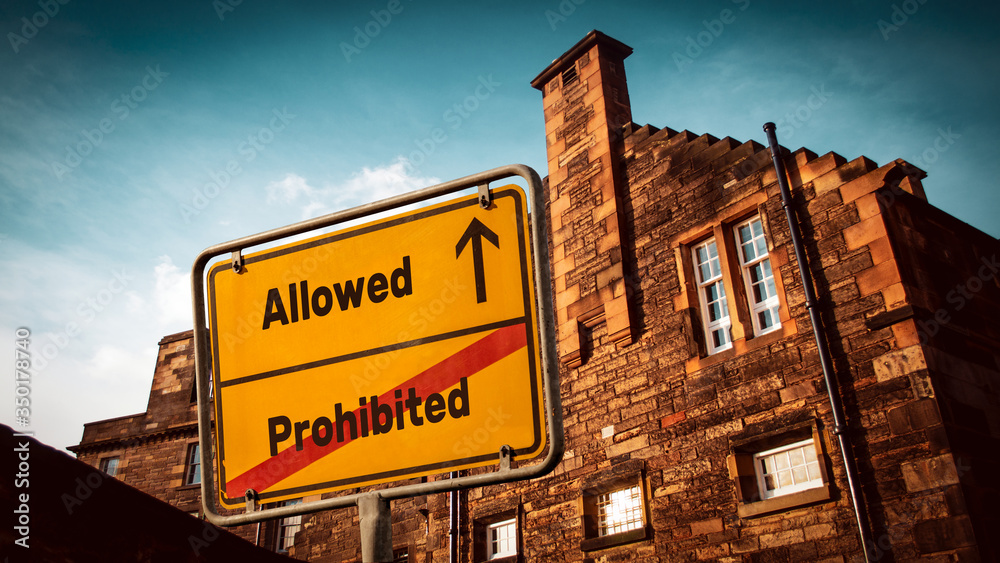 Fototapeta premium Street Sign to Allowed versus Prohibited