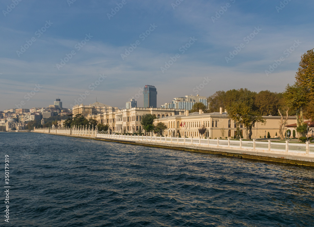 Obraz premium Istanbul, Turkey - built in 1843, and main administrative center of the Ottoman Empire, the Dolmabahçe Palace is a major tourist attraction. Here in particular its facade