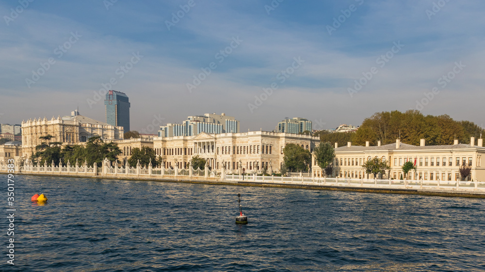 Obraz premium Istanbul, Turkey - built in 1843, and main administrative center of the Ottoman Empire, the Dolmabahçe Palace is a major tourist attraction. Here in particular its facade