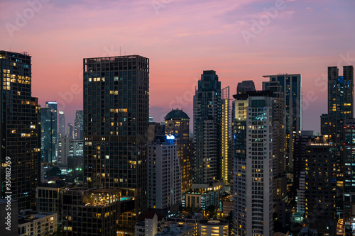 Panoramic view of Bangkok skyline at sunset. Modern city center of capital of Thailand. Contemporary buildings exterior with glass. © VideoFlow
