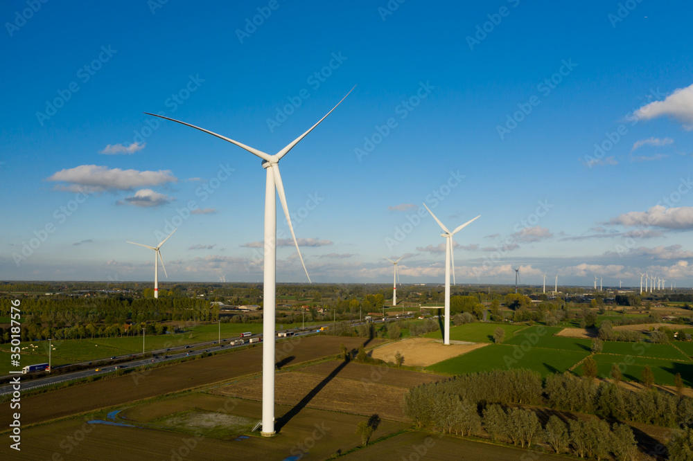 Wind turbine farm in Laarne, East Flanders, Belgium - aerial view Wind turbine farm in Laarne, East Flanders, Belgium - aerial view