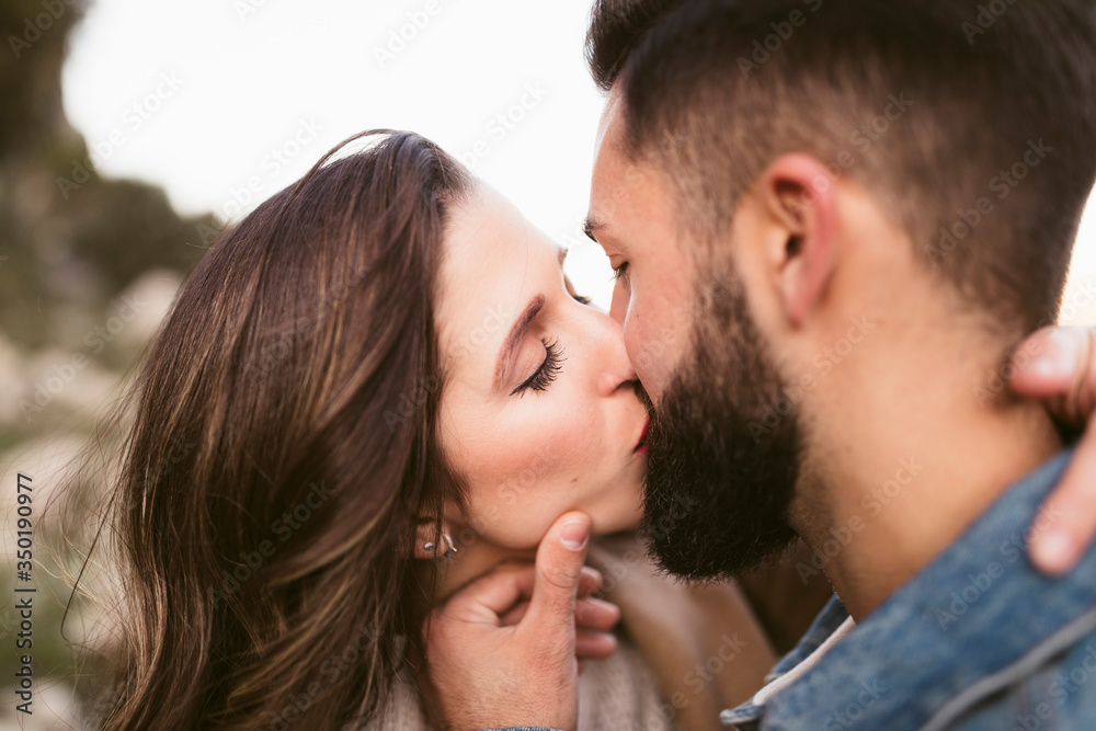 Close up lovely couple kissing Close up lovely couple kissing