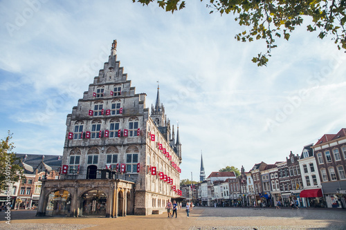 Gouda, Netherlands - June 29, 2019: Photo report of the Streets and center of the city of Gouda in Netherlands in Summer. Sunny day. Zone GOUDA CHEESE MARKET