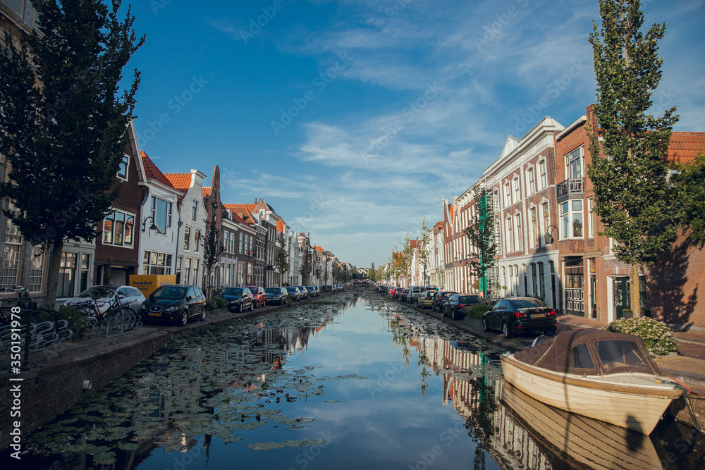 Gouda, Netherlands - June 29, 2019: Photo report of the Streets of the city of Gouda in Netherlands in Summer. Sunny day. City famous for its gouda cheese.