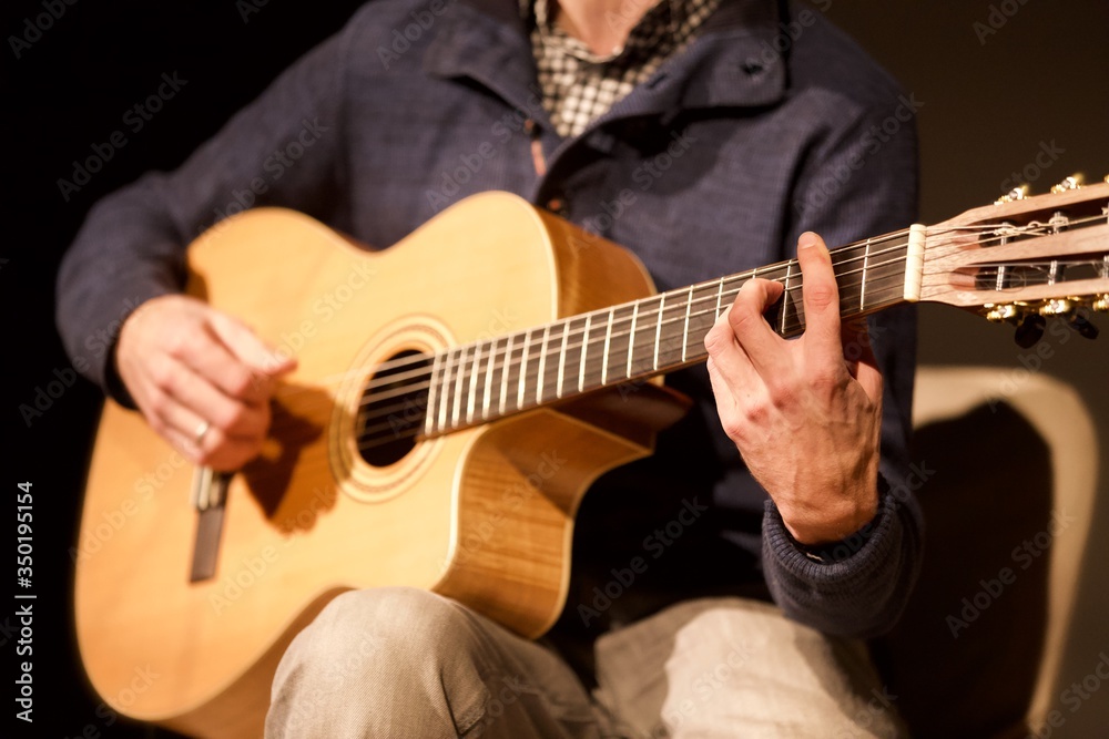 man playing guitar