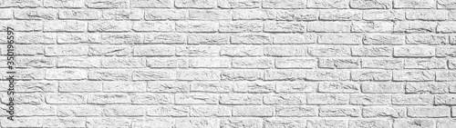 White bright painted rustic brick wall brickwork stonework masonry texture Background banner panorama  with copy space
