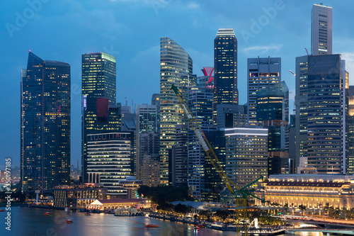 Picturesque panoramic view of Singapore city at sunset. Financial and trading center hub in Asia region. Concept of success. Modern buildings in high-tech world. © VideoFlow