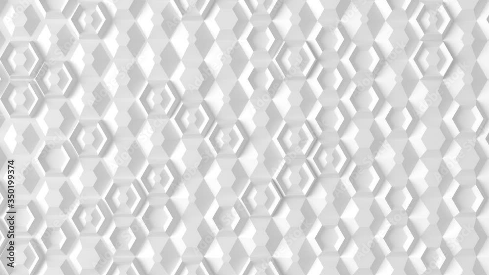 Seamless loop a white wall of many different hexagons manifests gradually from a flat white wall.3D render. Seamless loop a white wall of many different hexagons manifests gradually from a flat white wall.3D render.