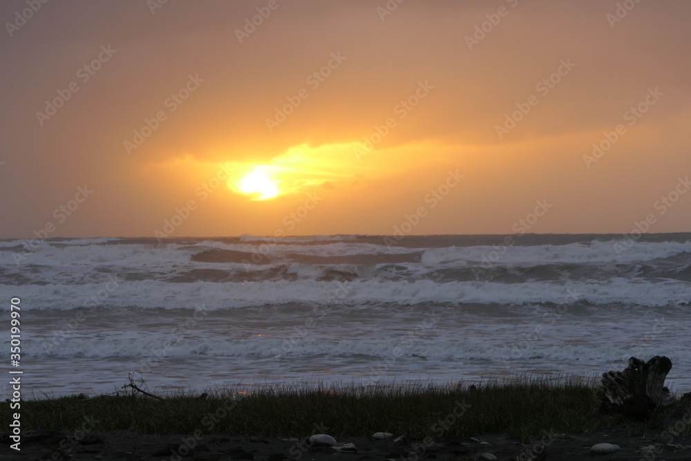 Fantastic scenery with roaring sea and sunset on the coast of the Tasman Sea between Australia and New Zealand