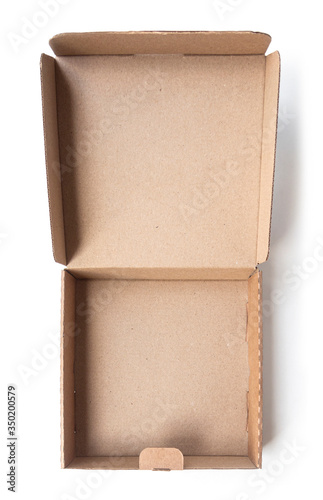 Open cardboard box in beige color isolated on a white background with natural shadow, top view. Can be used to display your products, gifts.