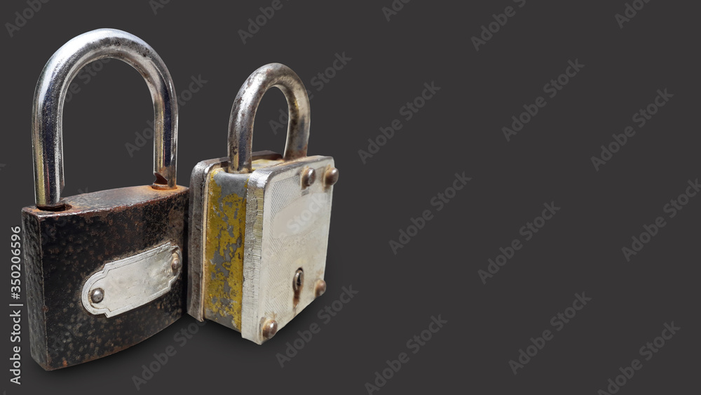 Iron pad lock for security purposes isolated photo in colorful background Iron pad lock for security purposes isolated photo in colorful background