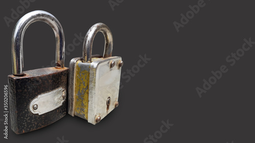 Iron pad lock for security purposes isolated photo in colorful background