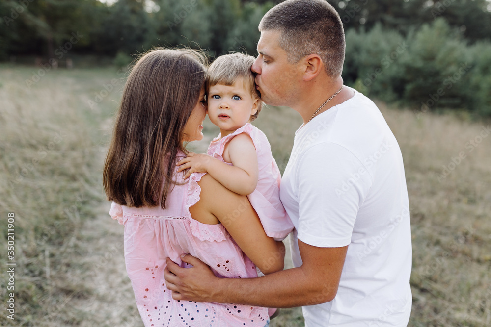 Happy family outdoors spending time together Happy family outdoors spending time together
