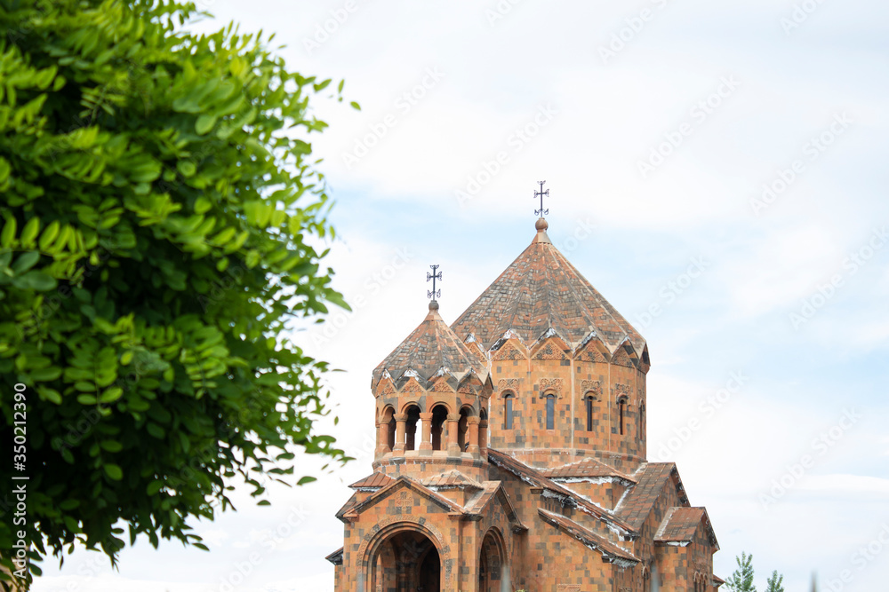 green tree and church in Armenia