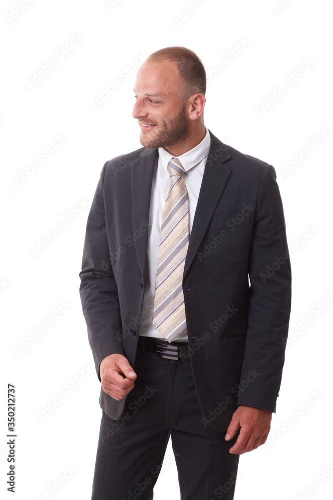 Happy businessman turning right, smiling as talking to someone, white background. Happy businessman turning right, smiling as talking to someone, white background.